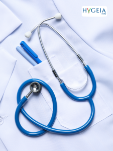blue stethoscope on a white lab coat with two blue pens in the pocket from freepik.com