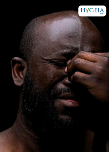 Man pinching his nose bridge in pain from freepik.com