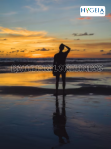 Man standing alone at the beach watching the sunset from freepik.com
