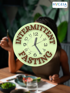 bLURRED IMAGE OF A LADY EATING IN THE BACKGROUND AND A FOCUSED IMAGE OF A CLOCK SAYING INTERMITTENT FASTING